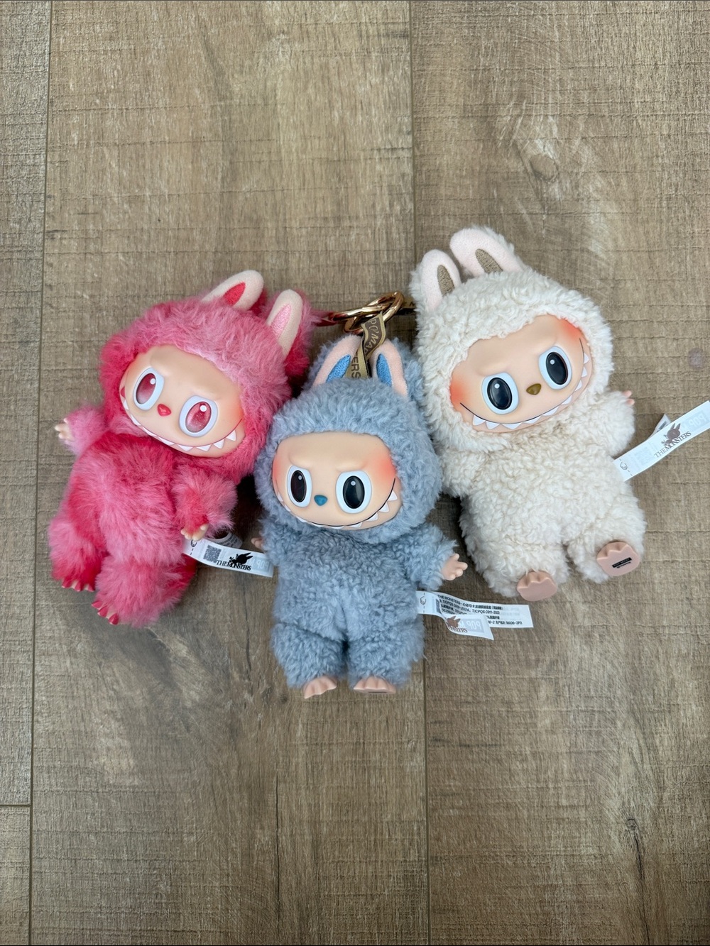 Three Labubu Plush Bunny Monster Keychain - Pink, Gray, and Cream